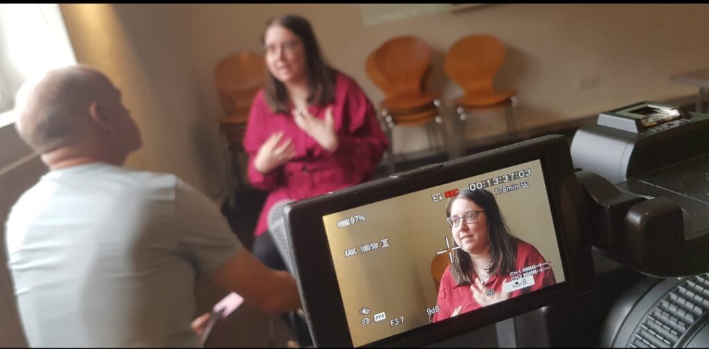 Being interviewed in a training session.